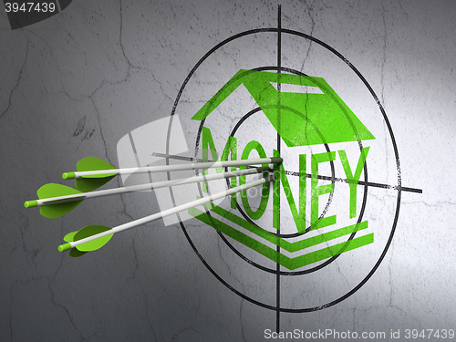 Image of Money concept: arrows in Money Box target on wall background