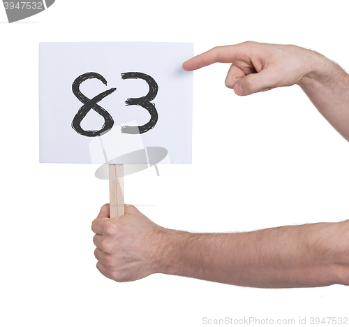 Image of Sign with a number, 83