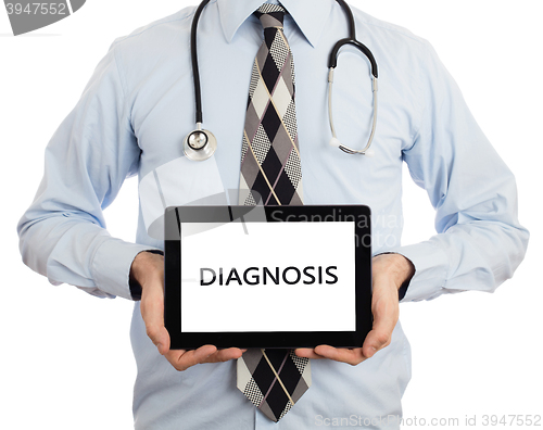 Image of Doctor holding tablet - Diagnosis