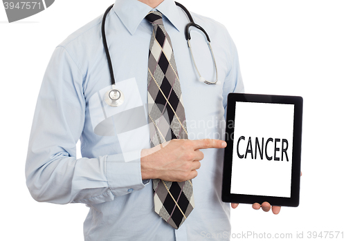 Image of Doctor holding tablet - Cancer