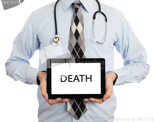 Image of Doctor holding tablet - Death