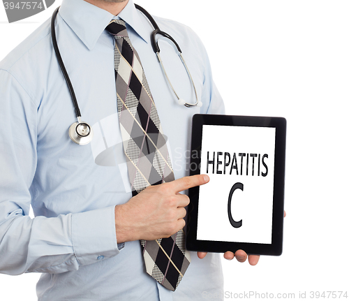 Image of Doctor holding tablet - Hepatitis C