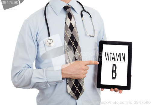 Image of Doctor holding tablet - Vitamin B