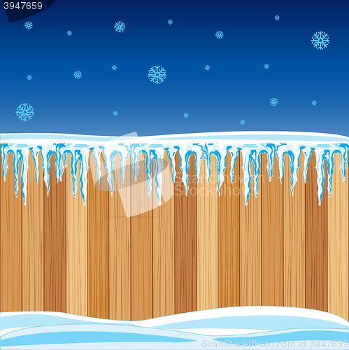 Image of Wooden fence in winter