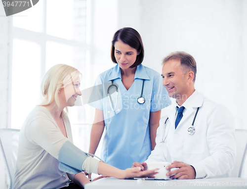 Image of doctor and patient in hospital