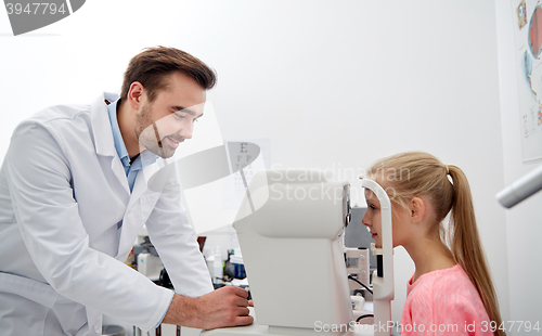 Image of optician with tonometer and patient at eye clinic