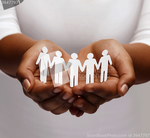 Image of african american female hands with paper people