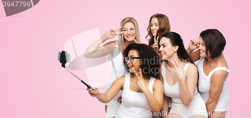 Image of group of happy women taking selfie by smartphoone