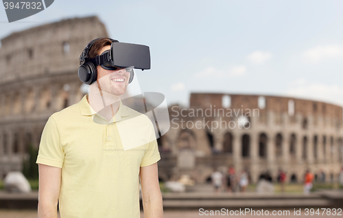 Image of happy man in virtual reality headset or 3d glasses