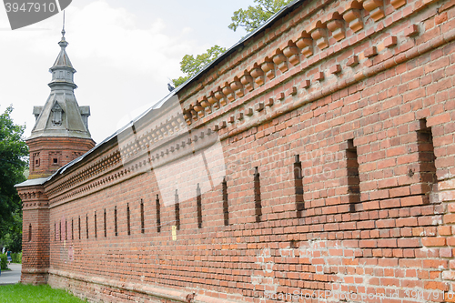 Image of Sergiev Posad - August 10, 2015: Red wall extending from the retail shops around pafnutevskigo garden at Holy Trinity St. Sergius Lavra in Sergiev Posad