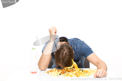 Image of man buried his face in the trash. isolated on white background