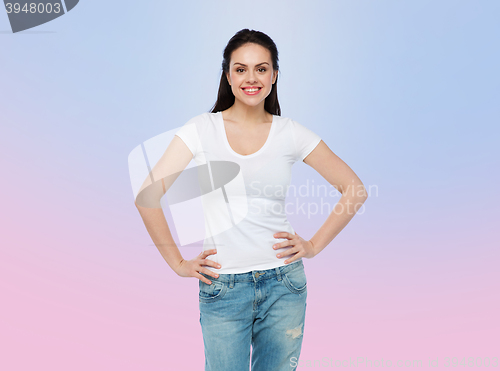 Image of happy young woman or teenage girl in white t-shirt