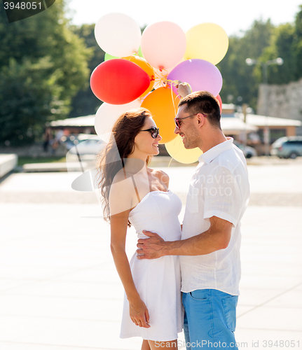 Image of smiling couple in city