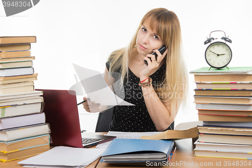 Image of Young student on the phone discussing the executed course project