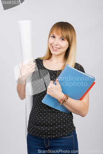 Image of The joyful girl with a roll of drawings and a folder in hands