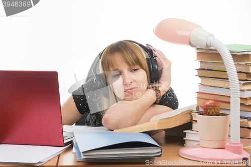 Image of Student thinking sad looking at a cactus