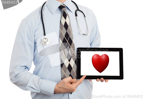 Image of Doctor holding tablet - Red heart