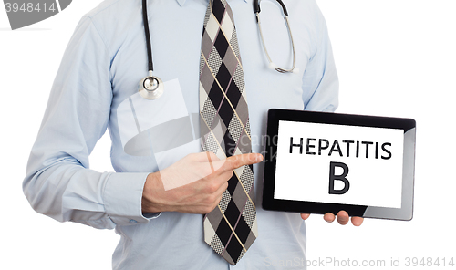 Image of Doctor holding tablet - Hepatitis B