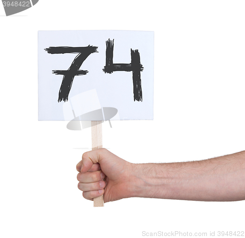 Image of Sign with a number, 74
