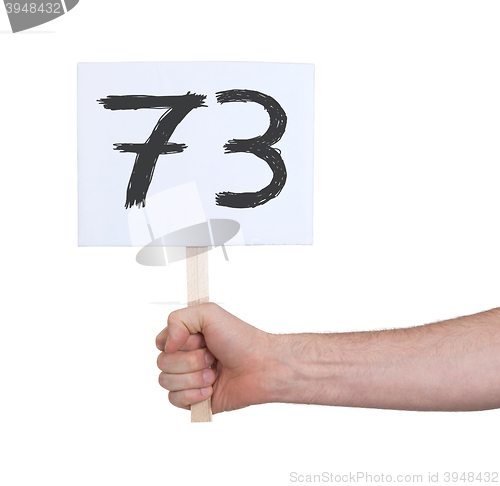 Image of Sign with a number, 73