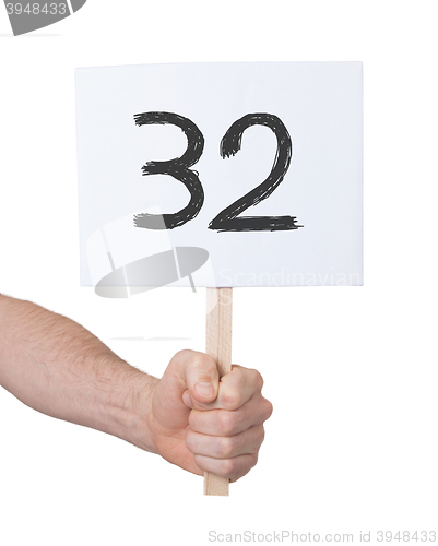 Image of Sign with a number, 32