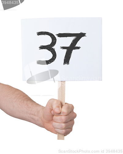 Image of Sign with a number, 37