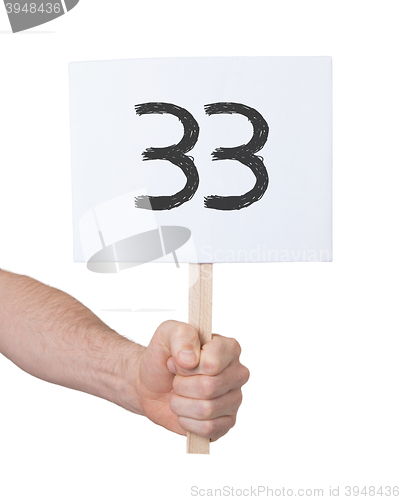 Image of Sign with a number, 33