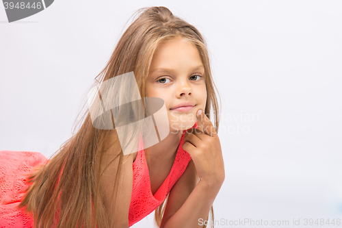 Image of Portrait of a seven-year Conceived girl on a white background