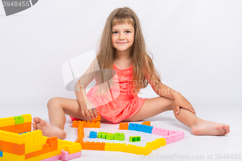 Image of Girl collects house of the block designer