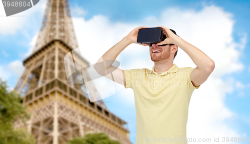 Image of happy man in virtual reality headset or 3d glasses