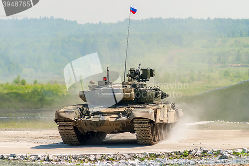 Image of Tank T-80s in motion