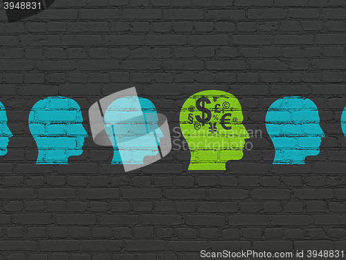 Image of Business concept: head with finance symbol icon on wall background