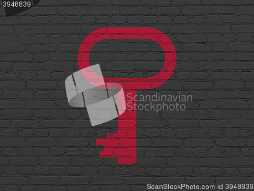 Image of Safety concept: Key on wall background