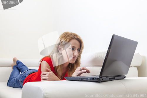 Image of Woman Using a Laptop