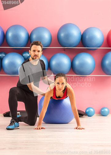 Image of Couple Training in a Gym