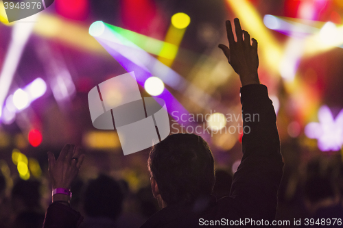 Image of older man enjoying a festival