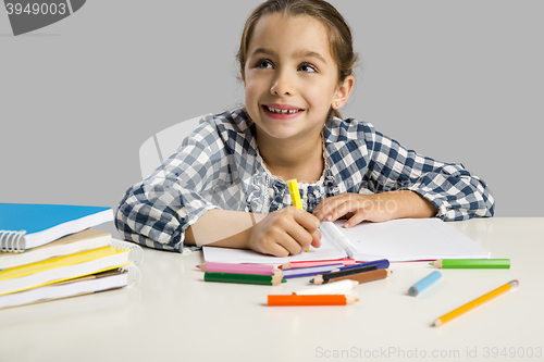 Image of Little girl making drawings