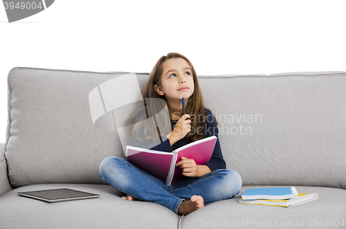 Image of LIttle girl studying