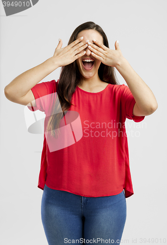 Image of Lovely woman covering her eyes