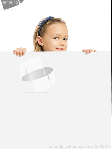 Image of Cute Girl holding a whiteboard