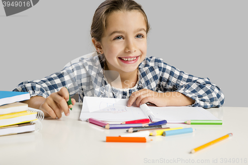 Image of Little girl making drawings