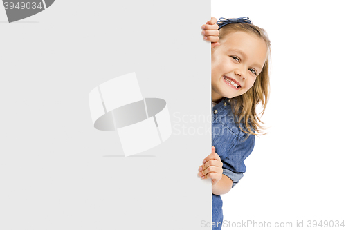 Image of Cute Girl holding a whiteboard