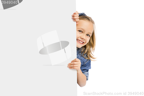 Image of Cute Girl holding a whiteboard