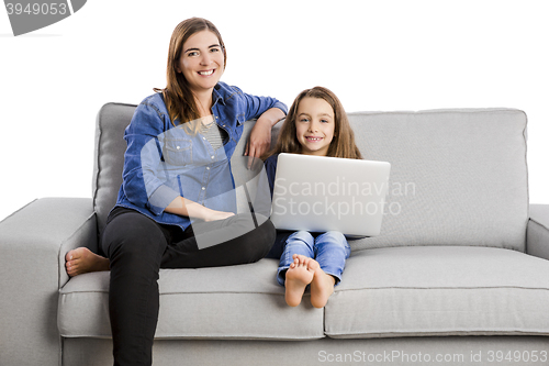 Image of Mother teaching her little daughter