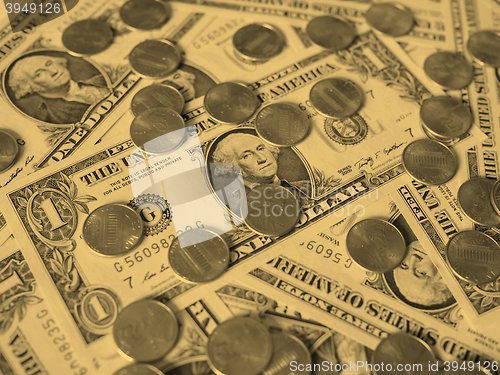 Image of Dollar coins and notes - vintage