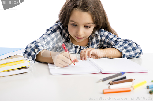 Image of Little girl making drawings