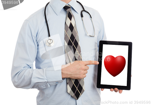 Image of Doctor holding tablet - Red heart