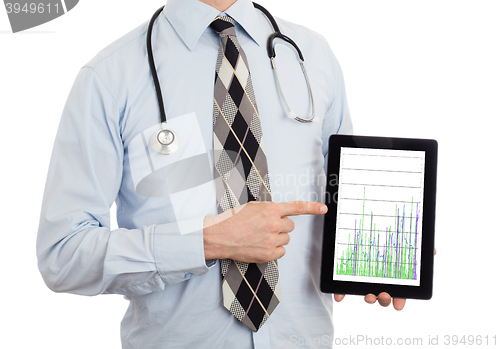 Image of Doctor holding tablet - Graph