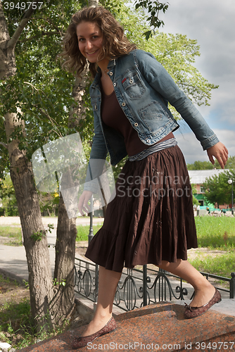 Image of Funny girl in city park