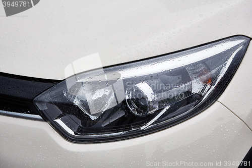 Image of raindrops on car in rainy season